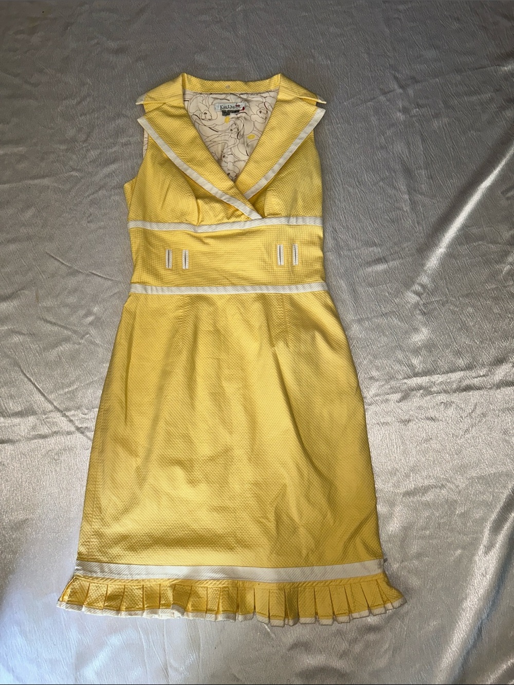 Yellow Sleeveless Wrap Dress with White Trim